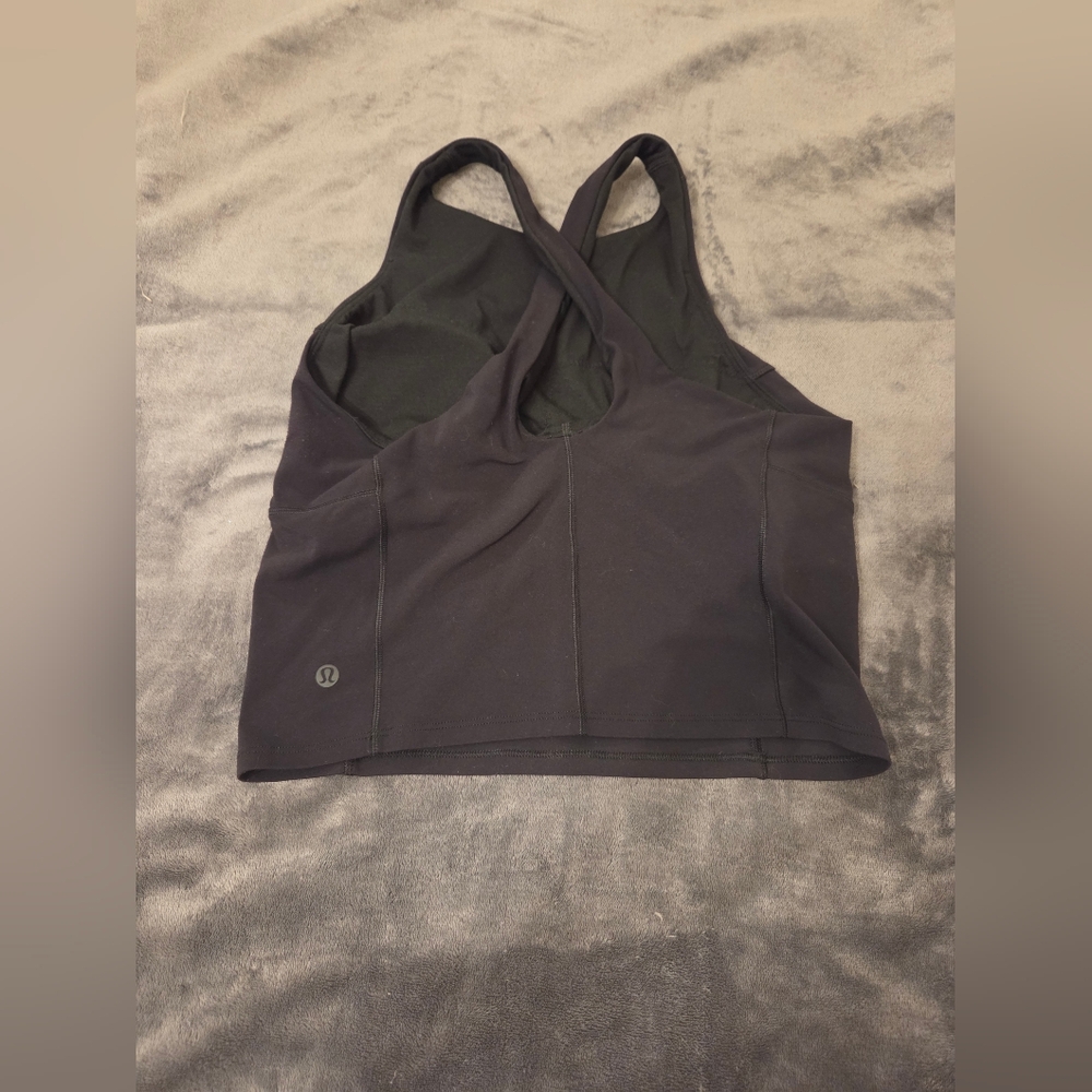 Lululemon Key to Balance Tank top. Size 8. Color is black. In good condition.